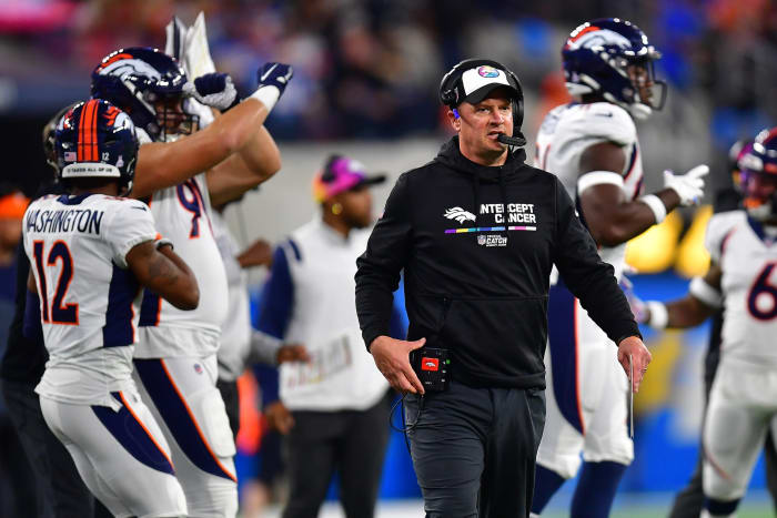 Denver Broncos head coach Nathaniel Hackett watches game action against the Los Angeles Chargers during the first half at SoFi Stadium.